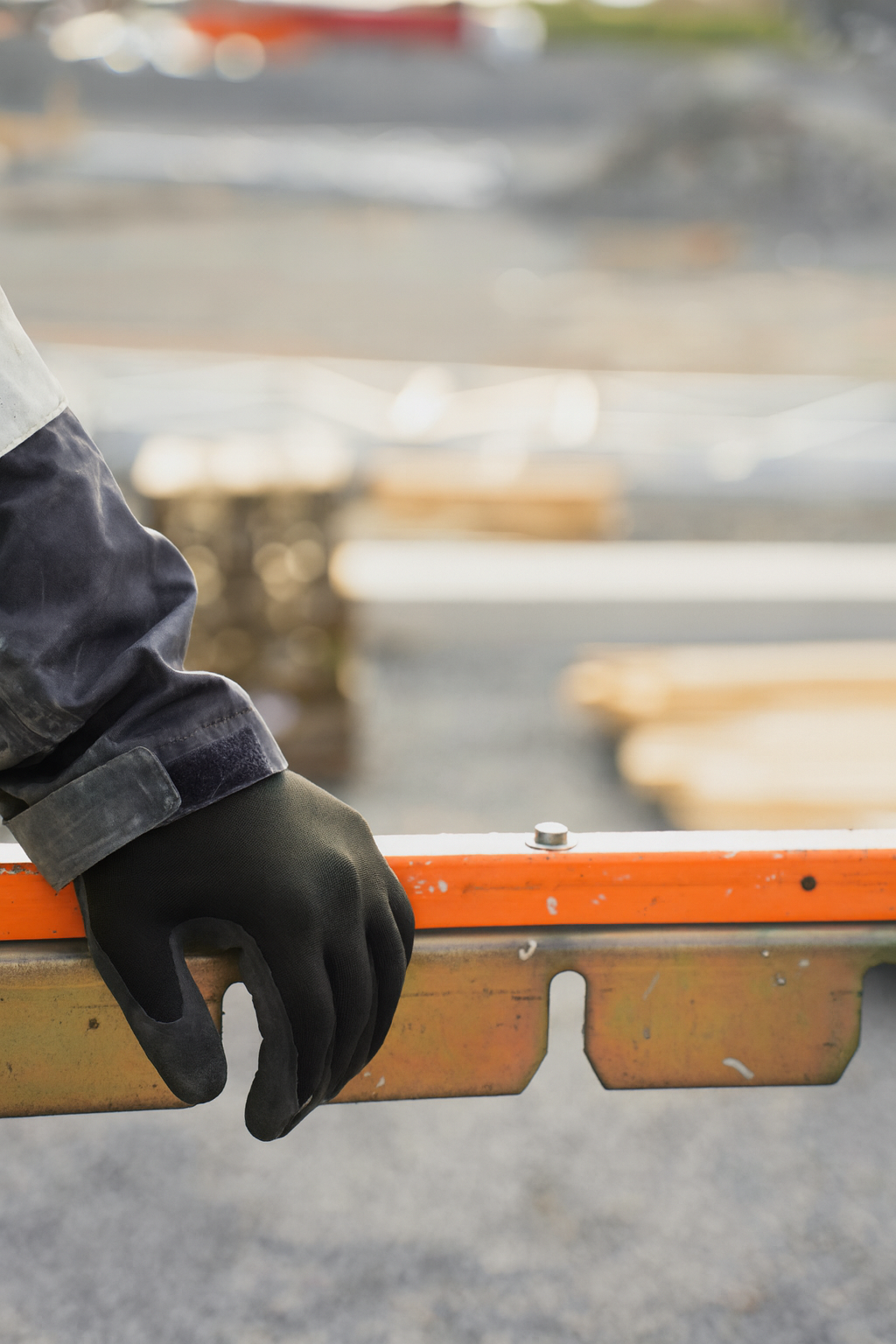 Image of a BAX Electric Electrician leaning on a new build project.